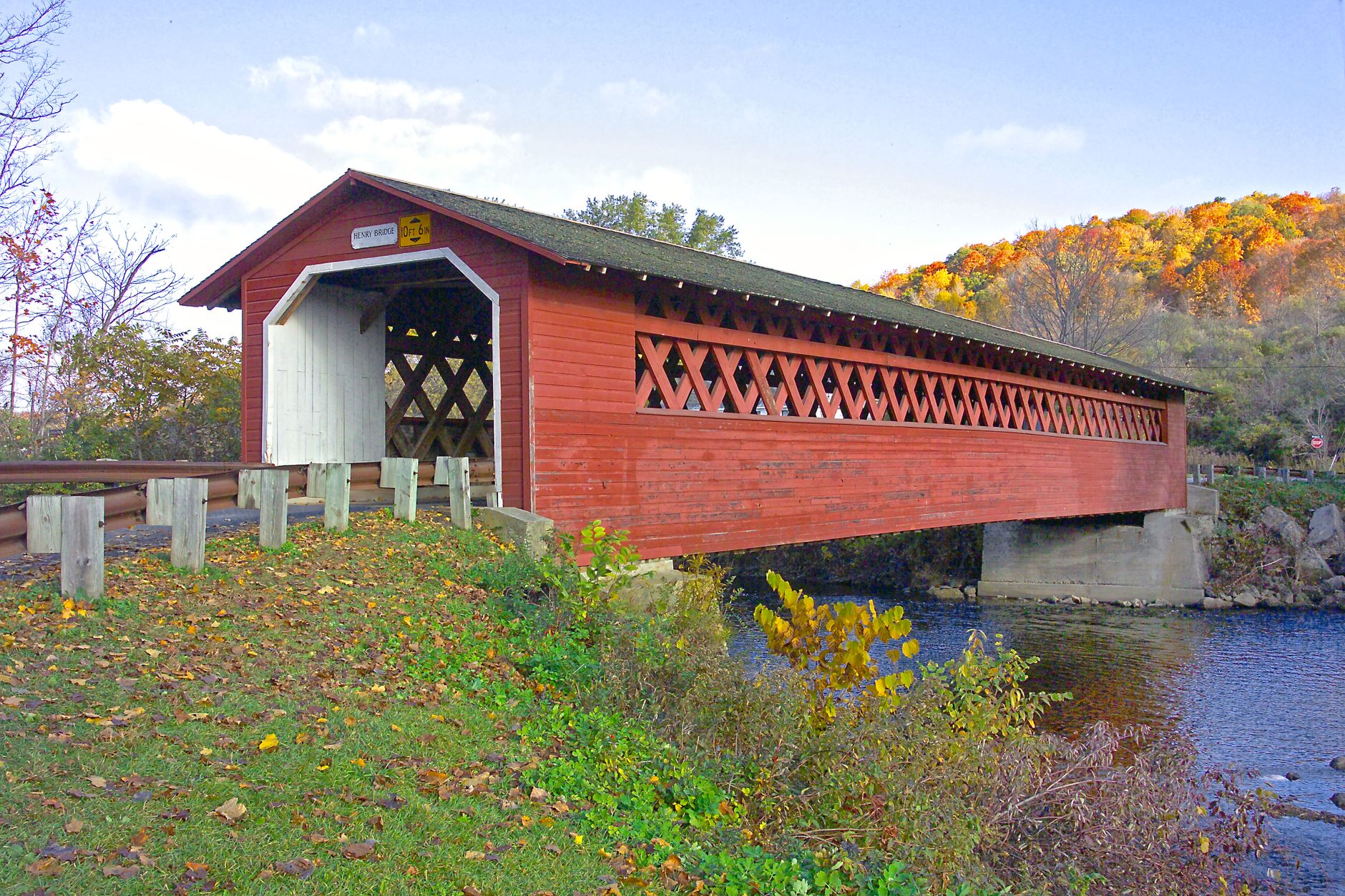 New England fall foliage charter bus tour Vermont landscape scene